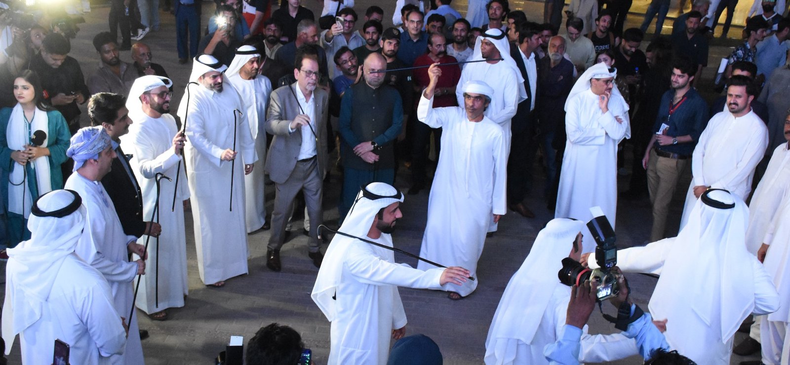 a group of men in white robes