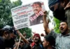 India’s education minister resigns after days of youth protests, protesters declare ‘Cockroaches won’