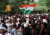 Indian government seeks more time on minister’s resignation after talks with youth protest leaders