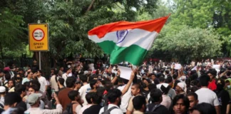 Indian government seeks more time on minister’s resignation after talks with youth protest leaders