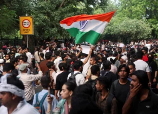 Indian government seeks more time on minister’s resignation after talks with youth protest leaders
